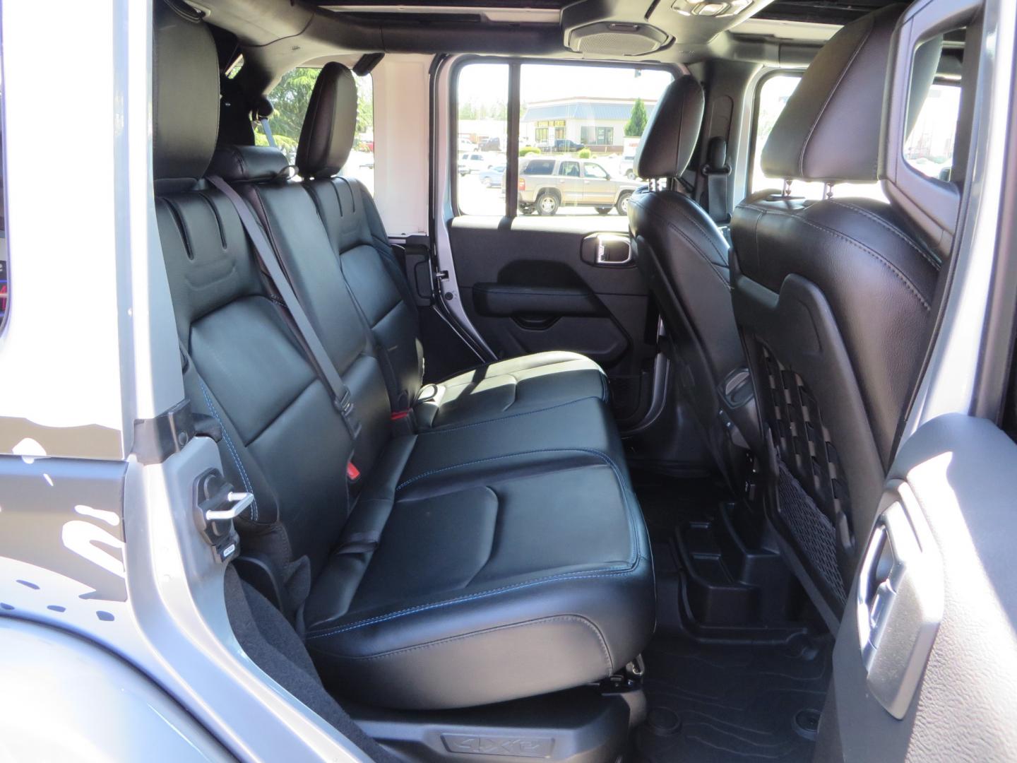 2021 SILVER /BLACK Jeep Wrangler Unlimited Rubicon 4XE 4d SUV 4wd (1C4JJXR63MW) with an 2.0L L4 DOHC 16V TURBO engine, automatic transmission, located at 2630 Grass Valley Highway, Auburn, CA, 95603, (530) 508-5100, 38.937893, -121.095482 - Impressive 4xe Rubicon with a ton of extras that include Fox 3.0 internal bypass front and rear shocks, 315 BFG KO2 tires, Warn winch, Factor 55 Ultra hook, Front bumper stinger, Rigid Pods on front bumper, Rigid A series lights in the roof rack, DV8 lockable hood pins, Westin Running boards, Fury d - Photo#62